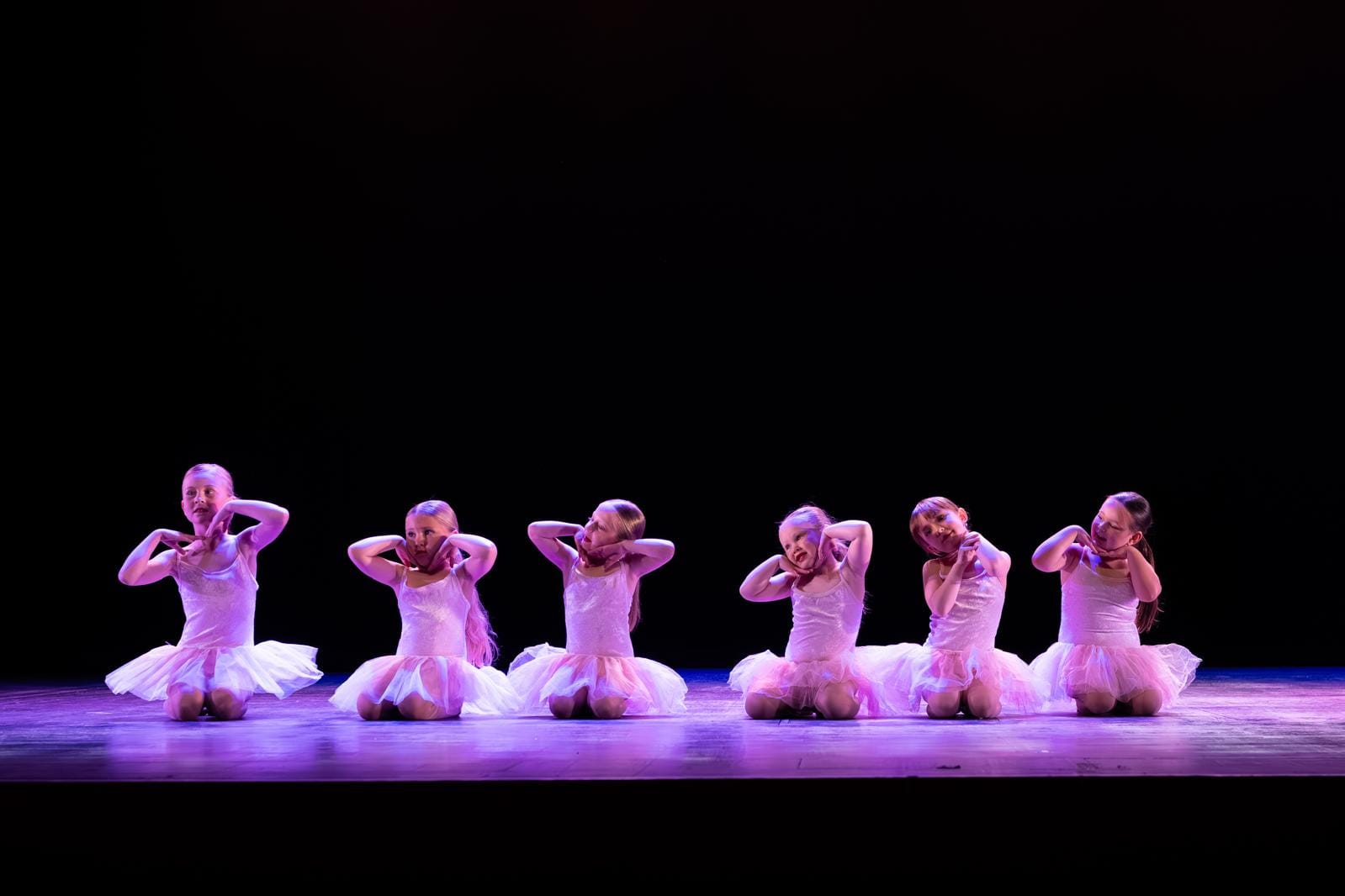 Young RFTS dancers in pink tutus on stage